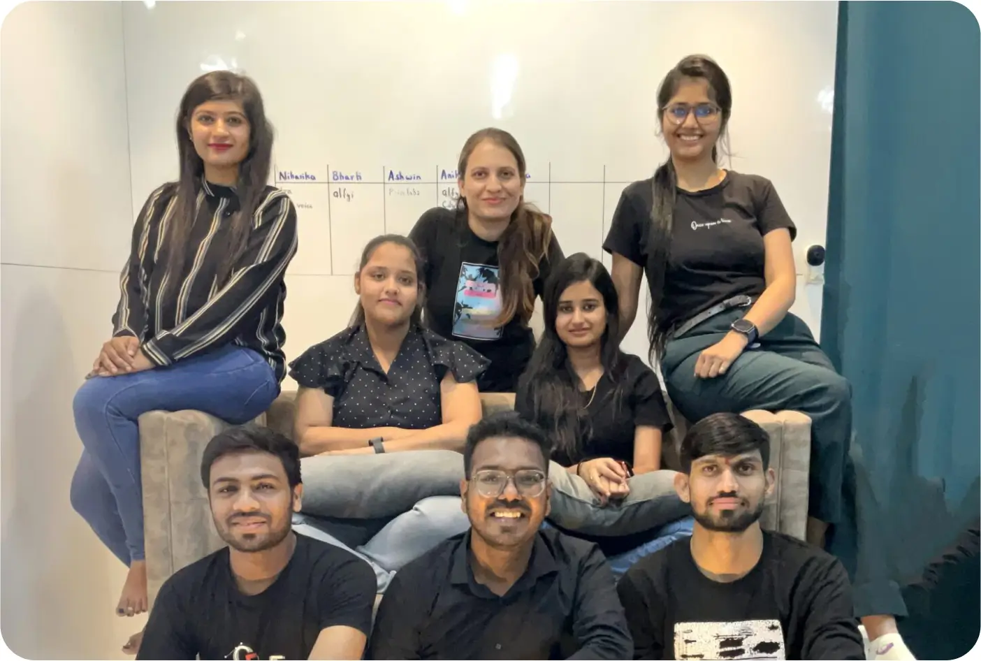 Alfyi team collaborating in office environment
